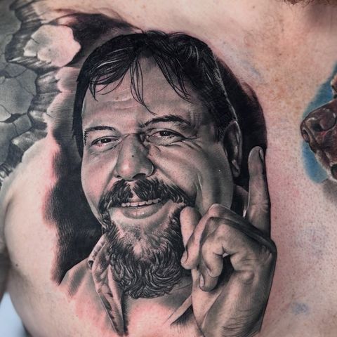 Black and gray portrait tattoo