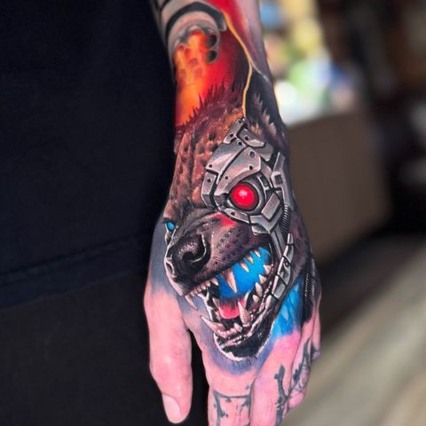 Cyborg hyena hand tattoo